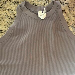 Light purple Athleta renew seamless racerback tank top.